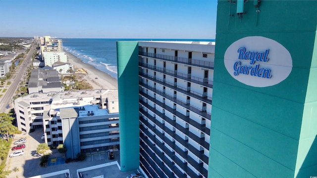 bird's eye view featuring a beach view and a water view