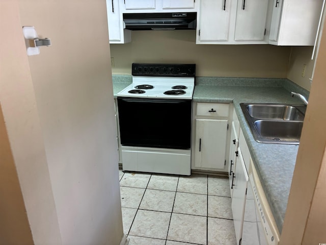 kitchen featuring white appliances, sink, light tile patterned floors, and white cabinets