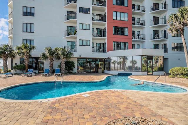 view of pool with a patio