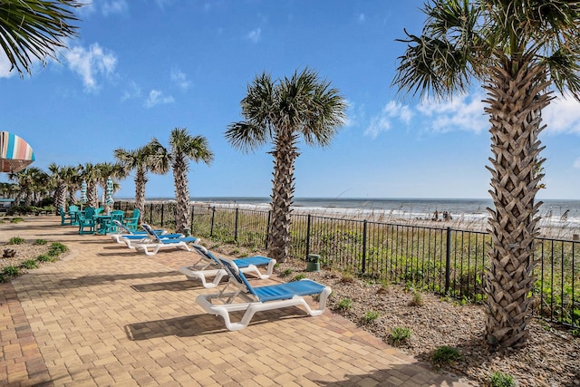 view of patio featuring a water view