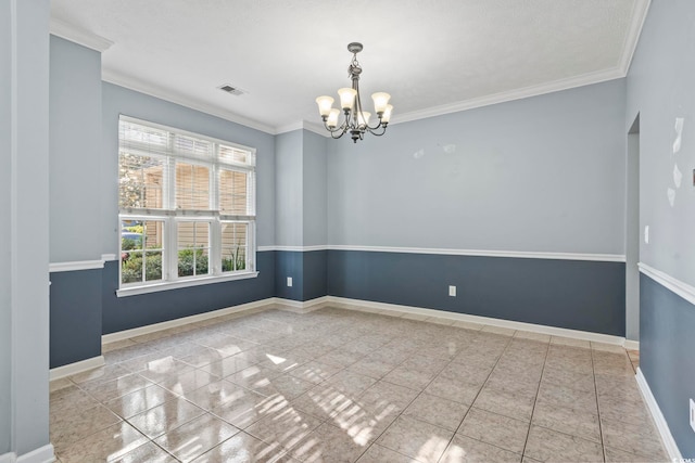 tiled empty room featuring crown molding, a textured ceiling, and a chandelier