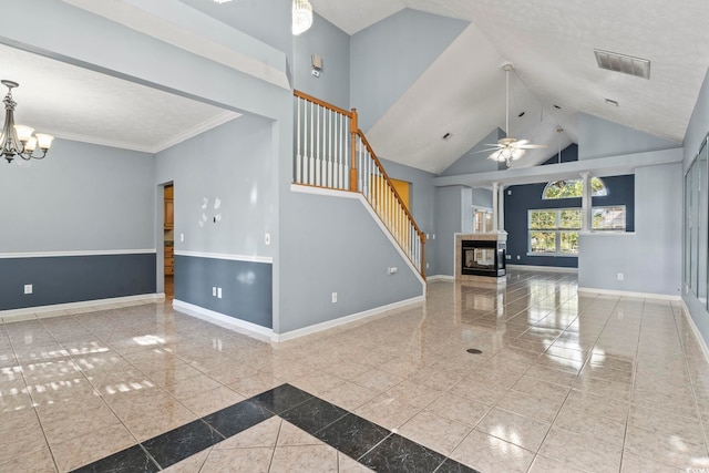 unfurnished living room featuring ceiling fan with notable chandelier, a textured ceiling, high vaulted ceiling, ornamental molding, and a multi sided fireplace