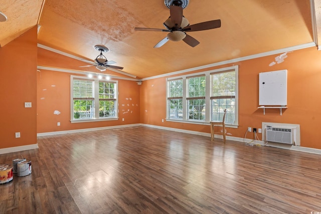 unfurnished living room with hardwood / wood-style flooring, ornamental molding, and vaulted ceiling