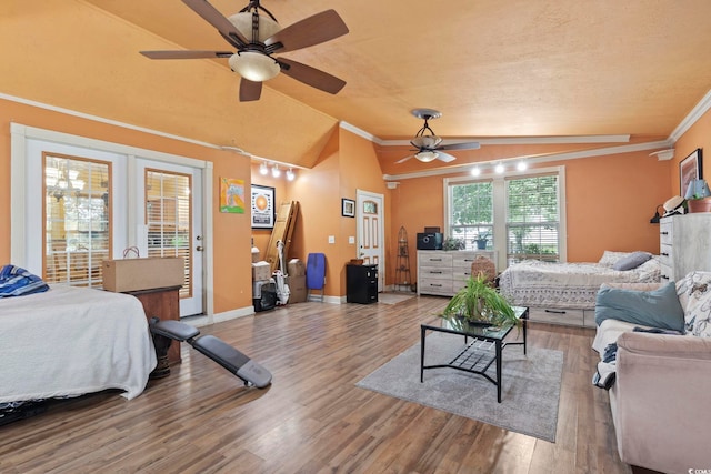 bedroom featuring access to outside, ceiling fan, wood-type flooring, and ornamental molding