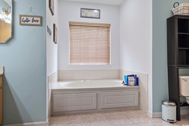 bathroom featuring a bath and tile patterned flooring