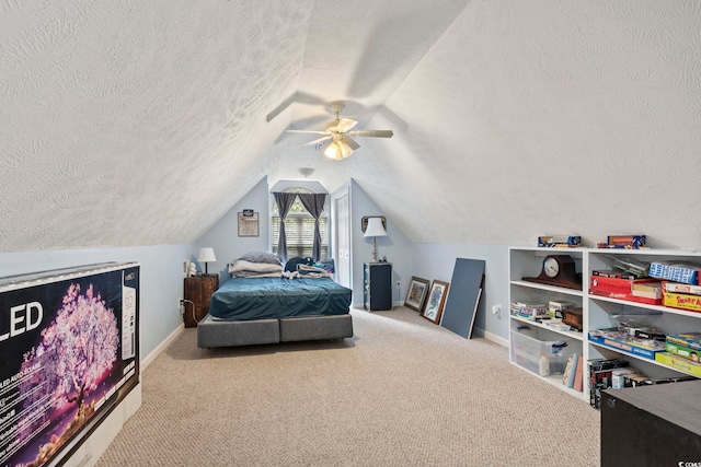 bedroom with light carpet, a textured ceiling, and ceiling fan