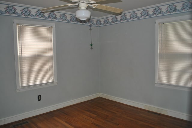 unfurnished room featuring ceiling fan, ornamental molding, and wood-type flooring