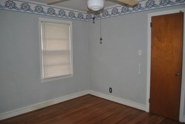 unfurnished room with a wealth of natural light and wood-type flooring