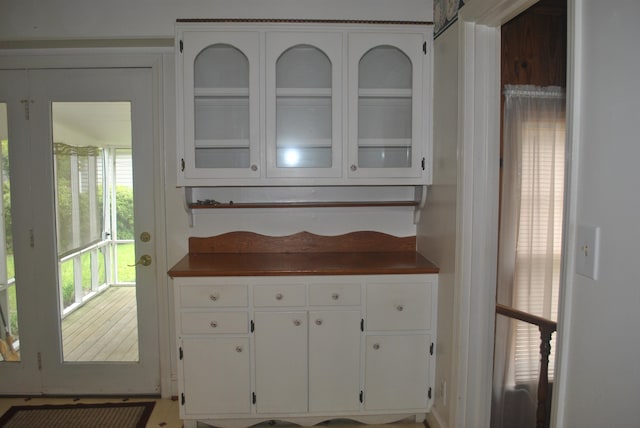 kitchen featuring white cabinetry