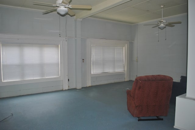 unfurnished room featuring ceiling fan