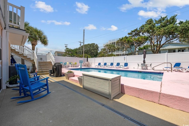 view of pool with a patio