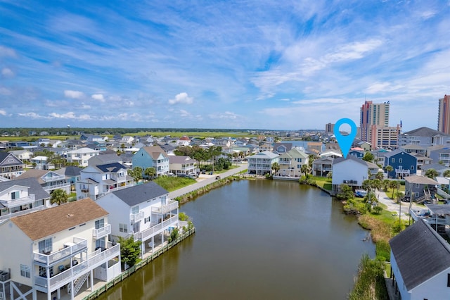 aerial view with a water view and a residential view