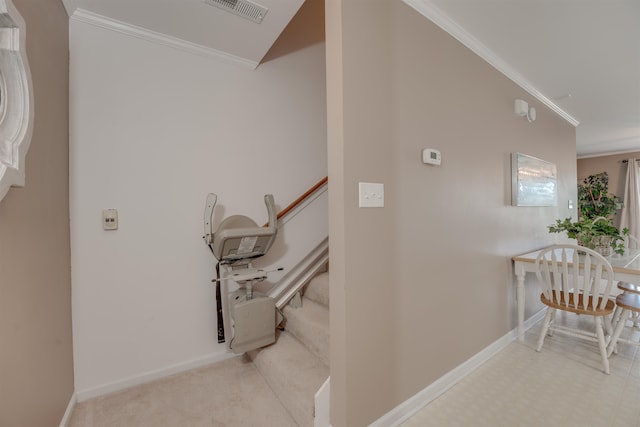 interior space featuring tile patterned floors and crown molding