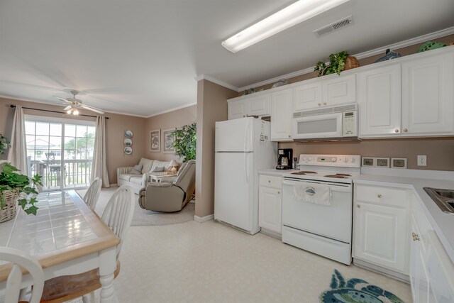 kitchen featuring ceiling fan, white cabinetry, sink, crown molding, and white appliances