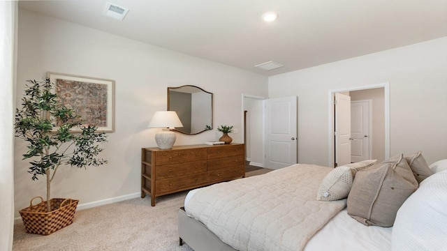 bedroom with light carpet