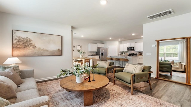 living room with light wood-type flooring