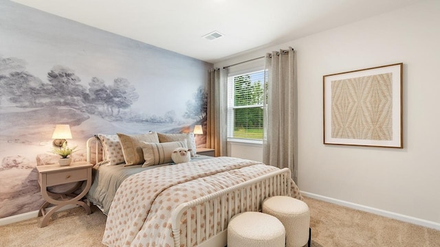 bedroom featuring light colored carpet