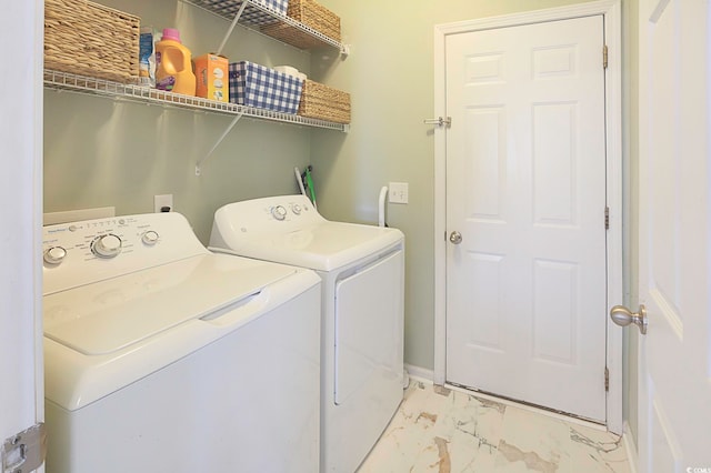 laundry area featuring separate washer and dryer