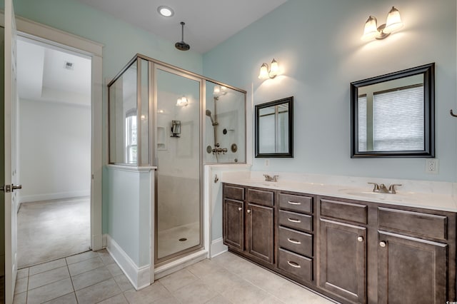 1348 Peterson St, Myrtle Beach, SC 29577 - bathroom featuring tile patterned flooring, a shower stall, double vanity, and baseboards