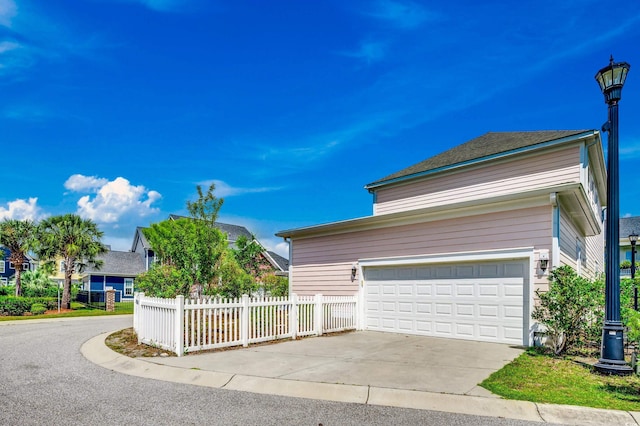 1348 Peterson St, Myrtle Beach, SC 29577 - view of home's exterior featuring a garage and driveway