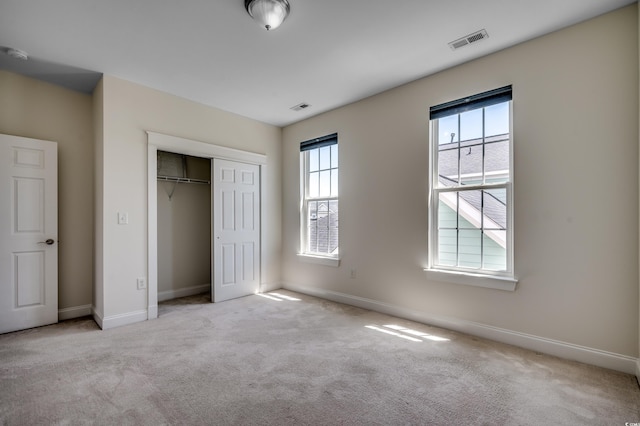 1348 Peterson St, Myrtle Beach, SC 29577 - unfurnished bedroom featuring carpet floors, baseboards, and a closet