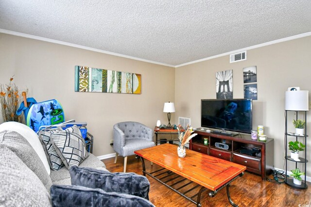 living room featuring ornamental molding, a textured ceiling, and dark hardwood / wood-style flooring