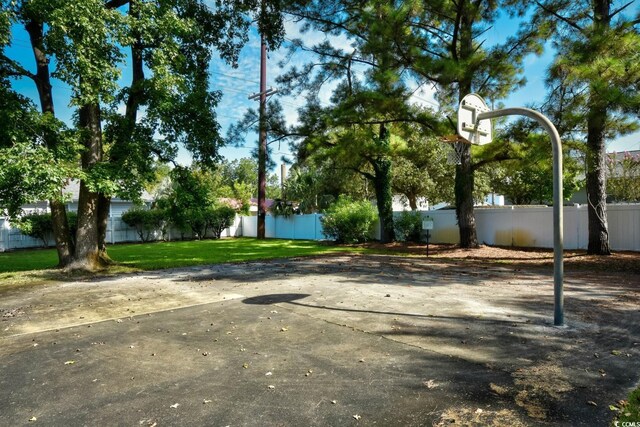 exterior space with basketball hoop