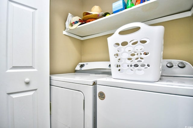 laundry area featuring laundry area and washer and clothes dryer