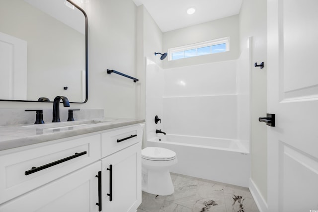 full bathroom with shower / washtub combination, vanity, and toilet