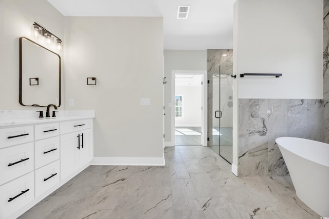 bathroom with vanity, shower with separate bathtub, and tile walls