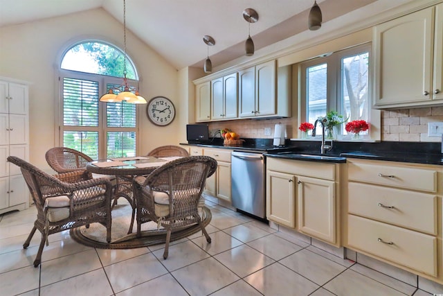 kitchen featuring dishwasher, cream cabinets, sink, and backsplash