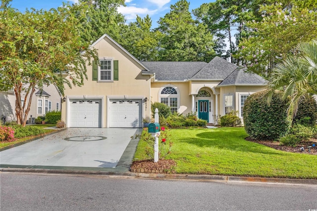 view of front facade with driveway, stucco siding, roof with shingles, an attached garage, and a front yard