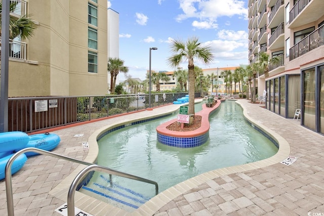5308 N Ocean Blvd Unit 812, Myrtle Beach, SC 29577 - community pool featuring fence