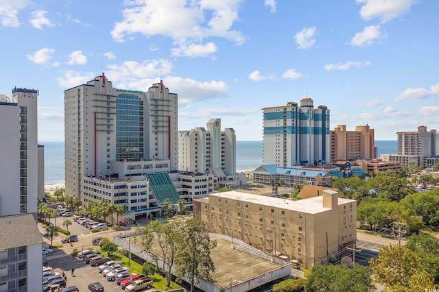 property's view of city with a water view