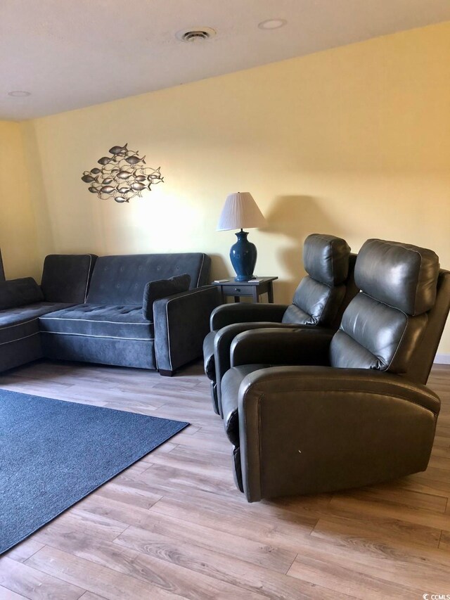 living room with light hardwood / wood-style floors