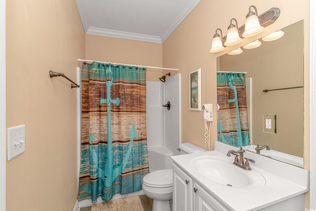 full bathroom featuring ornamental molding, toilet, and vanity