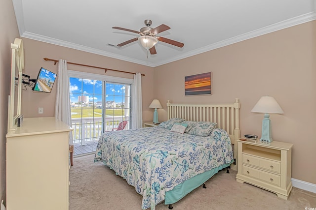 carpeted bedroom featuring crown molding, access to exterior, and ceiling fan