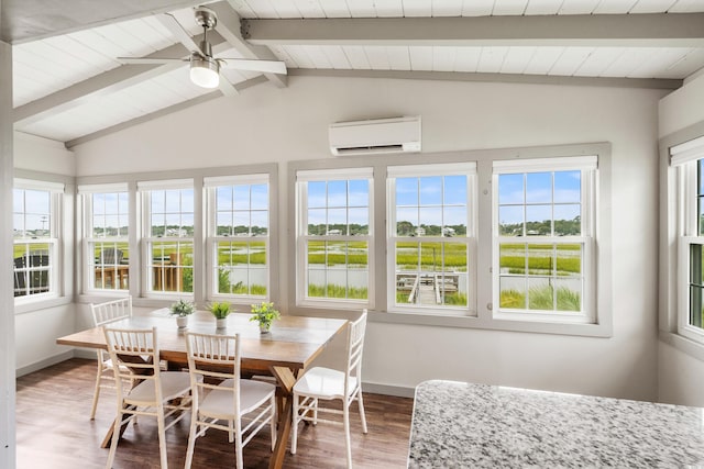 sunroom with vaulted ceiling with beams, a wall unit AC, and ceiling fan