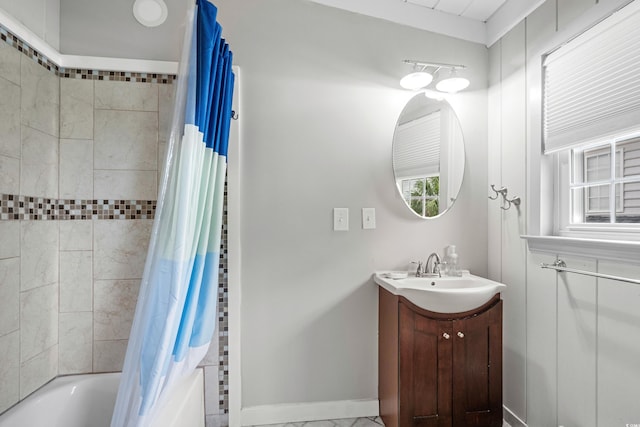 bathroom featuring vanity and shower / bath combo