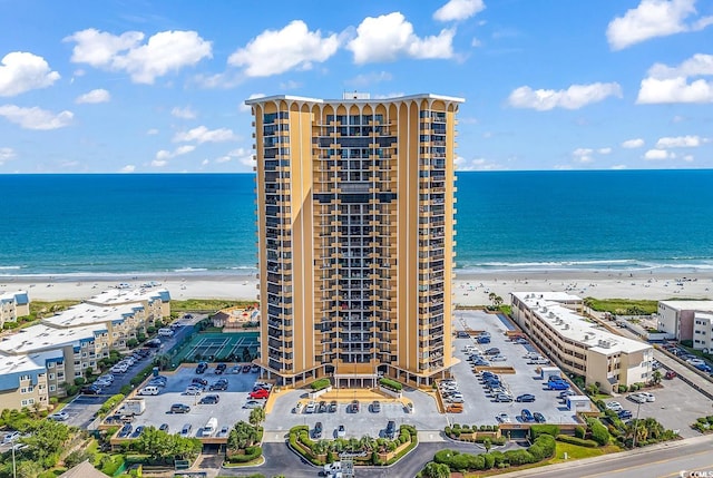 drone / aerial view with a view of the beach and a water view