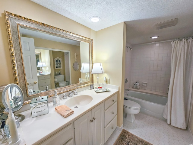 full bathroom featuring tile patterned flooring, vanity, toilet, and shower / bath combination with curtain