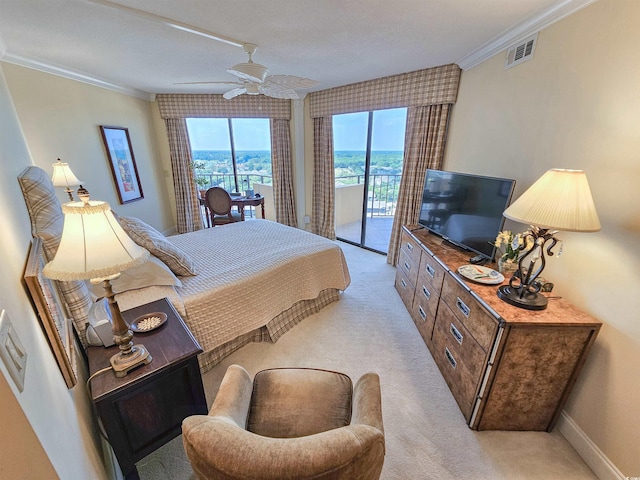 carpeted bedroom with ceiling fan, crown molding, and access to exterior