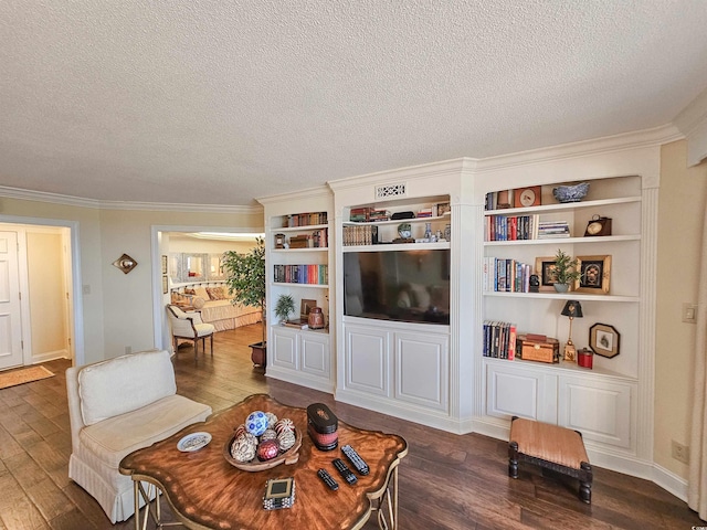 interior space featuring ornamental molding, a textured ceiling, and dark wood-type flooring