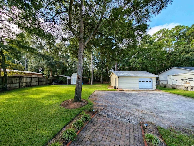 exterior space with an outbuilding and a garage