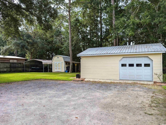 garage with a yard