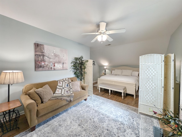 bedroom with hardwood / wood-style flooring and ceiling fan