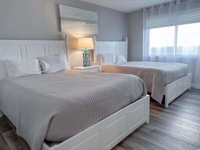 bedroom featuring light wood-style flooring