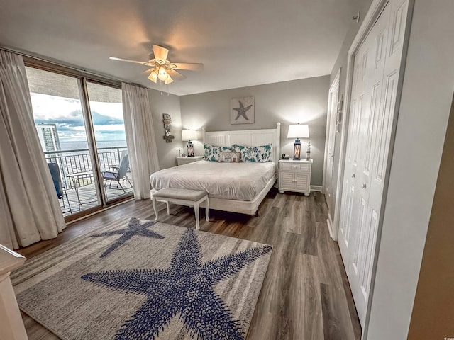 bedroom with ceiling fan, hardwood / wood-style flooring, and access to outside