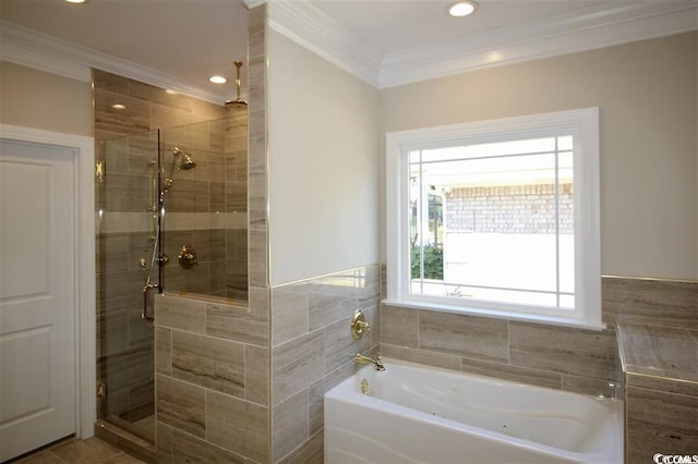 bathroom featuring plus walk in shower, crown molding, and a healthy amount of sunlight