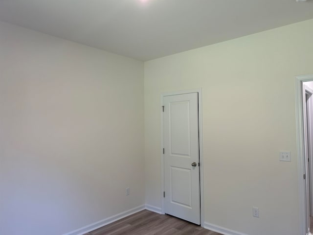 unfurnished room featuring light wood-type flooring